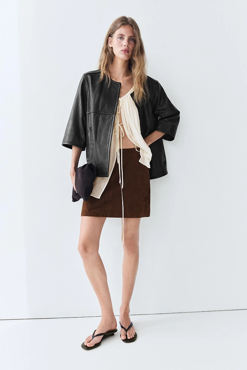 Suede leather mini skirt