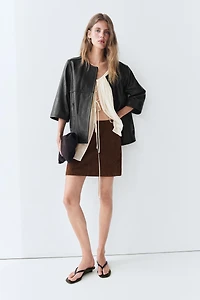 Suede leather mini skirt