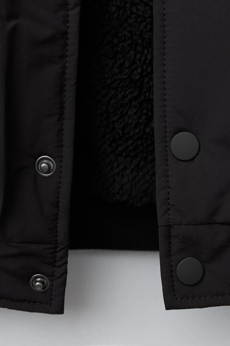 BOMBER DOUBLURE FAUSSE PEAU DE MOUTON PIÈCE