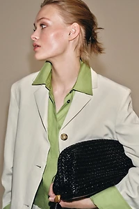 WOVEN POUCH BAG
