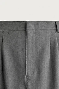 WIDE-FIT PLEATED TROUSERS