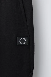 INTERLOCK PIQUÉ JOGGER PANTS