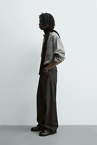 CHEMISE EN JEAN DÉLAVÉ À ÉCLABOUSSURES