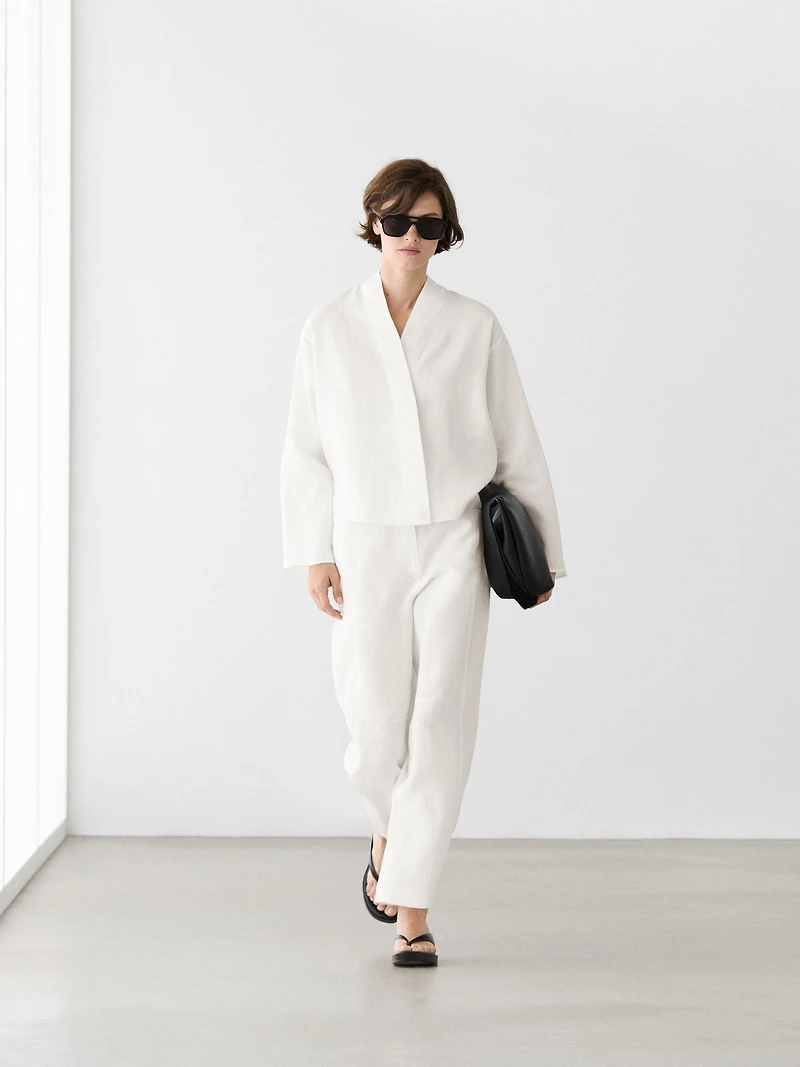 Flowing linen blouse with surplice neckline