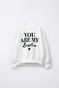 FLOCKED TEXT SWEATSHIRT