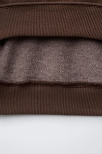 PATCH PRINT SWEATSHIRT