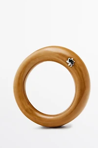 Ceramic tubular bracelet with star detail