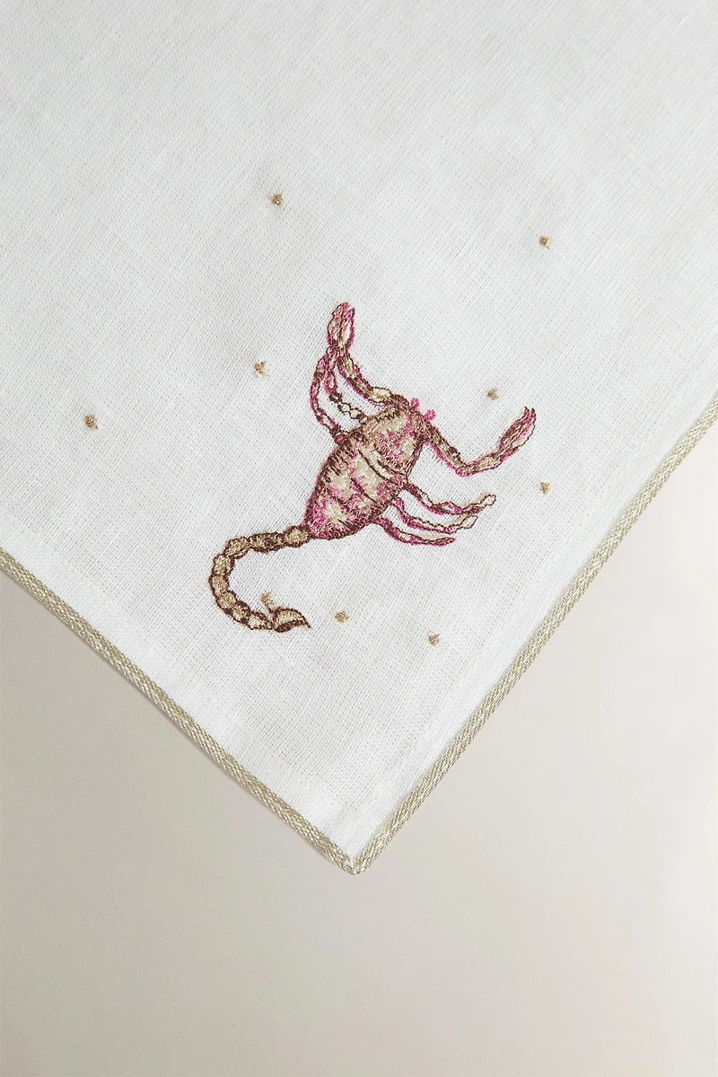 SCORPIO EMBROIDERED LINEN NAPKIN | MARISA BERENSON
