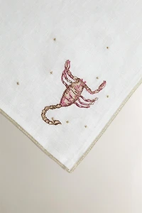 SCORPIO EMBROIDERED LINEN NAPKIN | MARISA BERENSON