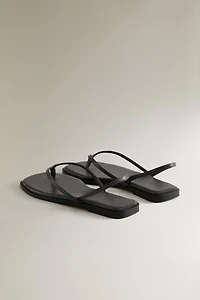 ASYMMETRIC STRAP LEATHER SANDALS