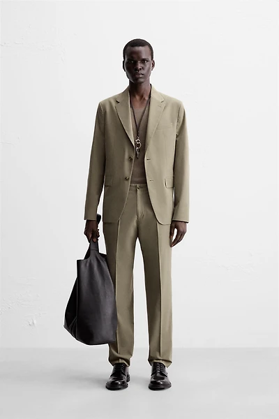 TEXTURED SUIT PANTS