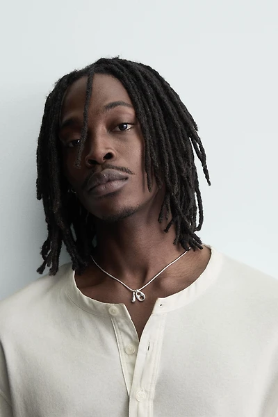 TUBULAR CHAIN WITH PENDANTS