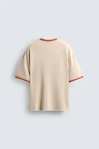 T-SHIRT EN MAILLE IMPRIMÉ DÉLAV