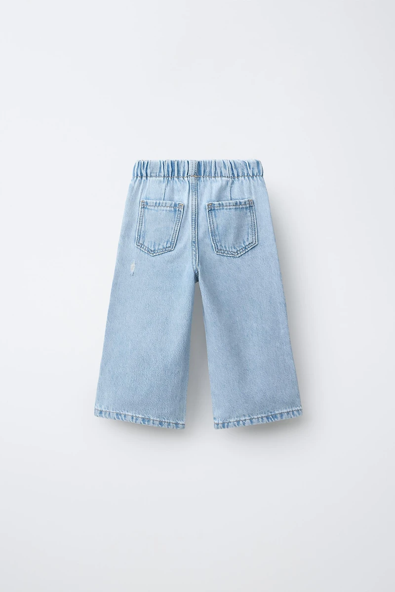 JEAN WIDE LEG À DÉCHIRURES