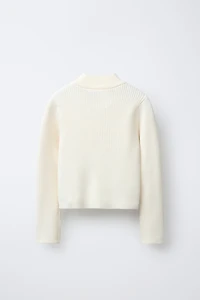PULL CANNELÉ COL CHEMINÉE CHAMPION ® X ZARA