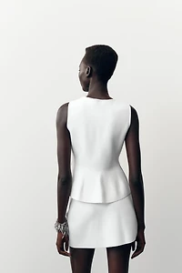 TOP EN MAILLE PÉPLUM