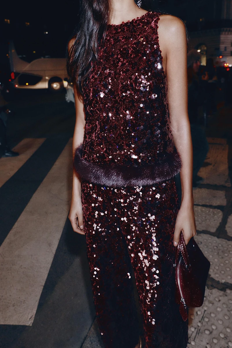 SEQUIN TOP WITH FAUX FUR HEM