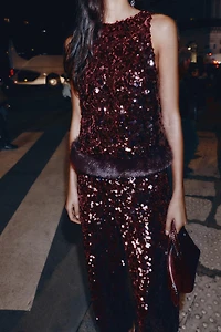 SEQUIN TOP WITH FAUX FUR HEM