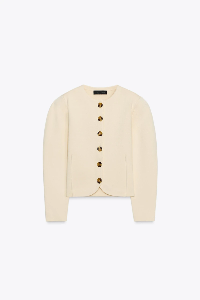 GILET EN MAILLE AJUSTÉ À BOUTONS