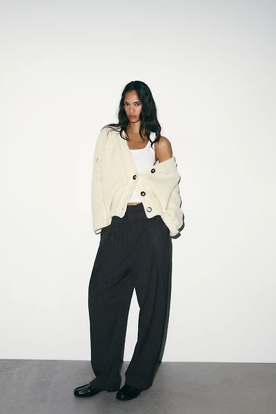 PANTALON BALLON À RAYURES ET PLIS