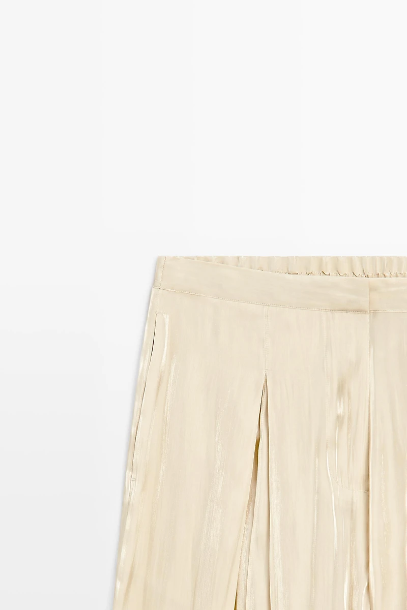 Pantalon fluide en tissu satiné