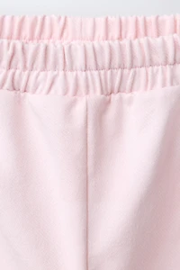 PANTALON À PINCES CŒURS