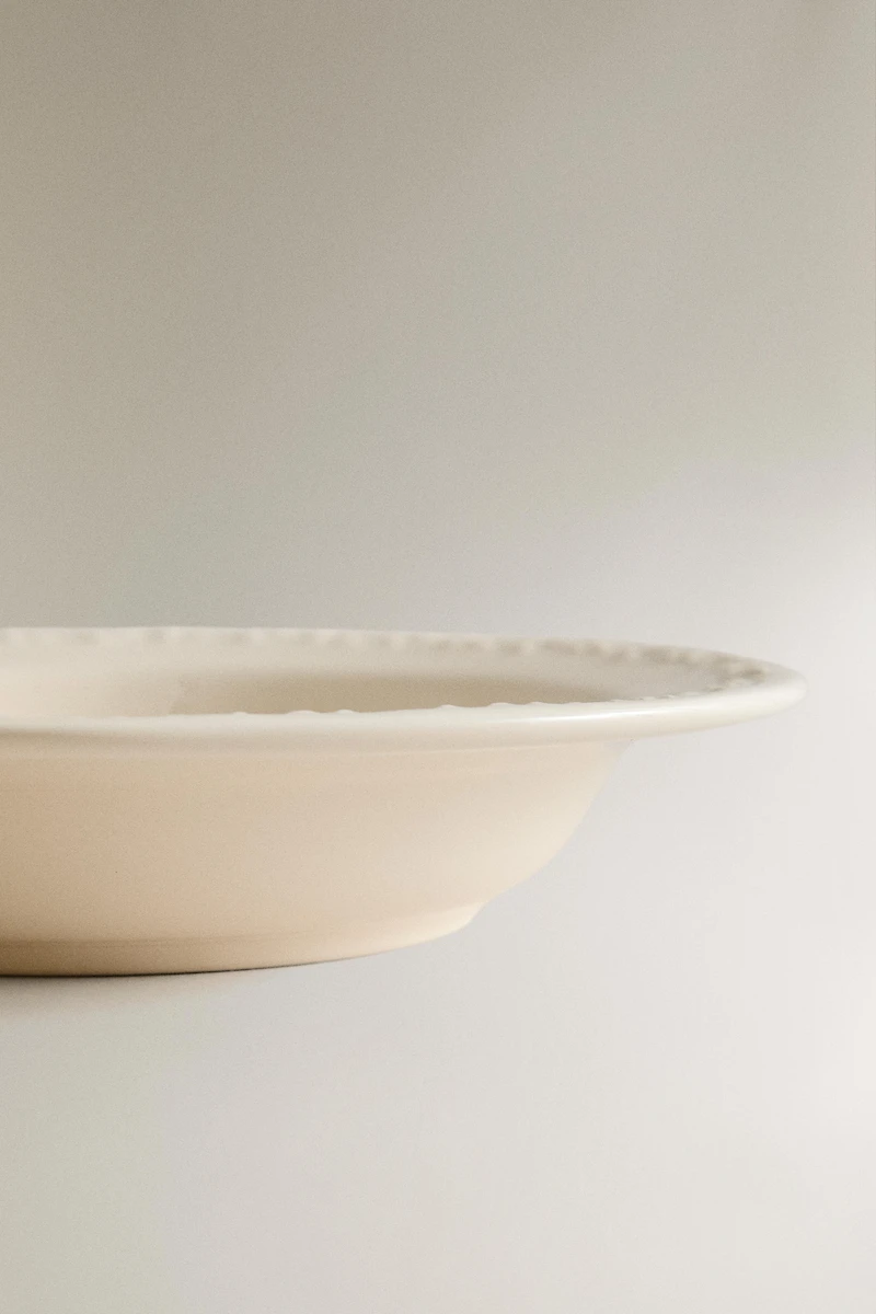 EARTHENWARE SOUP PLATE WITH RAISED RIM