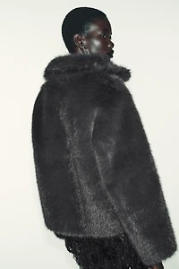 MANTEAU COURT RÉVERSIBLE EFFET FOURRURE