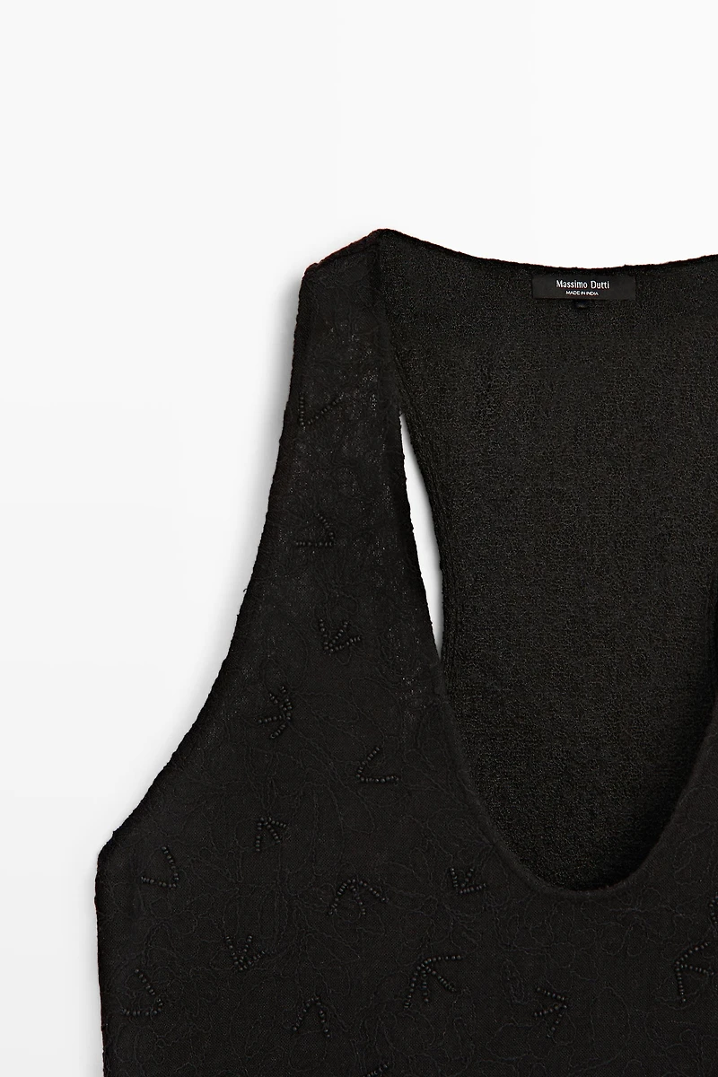 Flowing top with embroidery