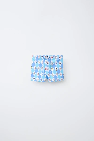 2-6 YEARS / CIRCUS PRINT SWIM TRUNKS