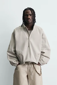 ZIPPERED POUCH POCKET SWEATSHIRT