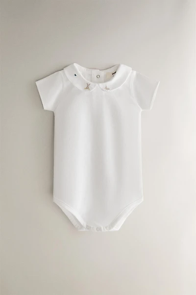 KIDS RABBIT AND FLORAL BODYSUIT