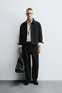 RELAXED FIT PLEATED PANTS