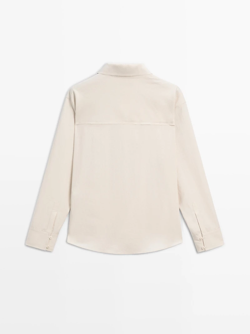 Flowing blouse with button detail