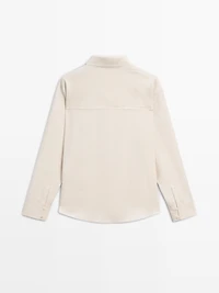 Flowing blouse with button detail