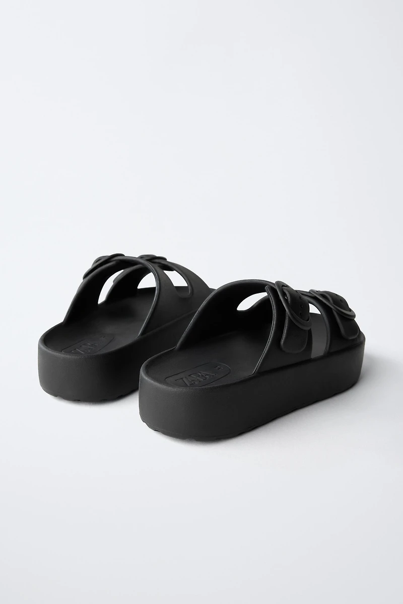 RUBBERIZED BUCKLED SANDALS