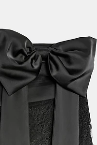 COMBINATION LACE BOW MINI SKIRT