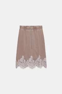 WASHED EFFECT SKIRT WITH LACE TRIM