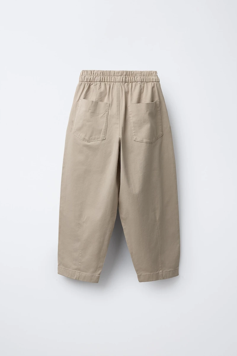 PANTALON BALLON À PLIS
