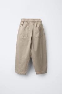 PANTALON BALLON À PLIS