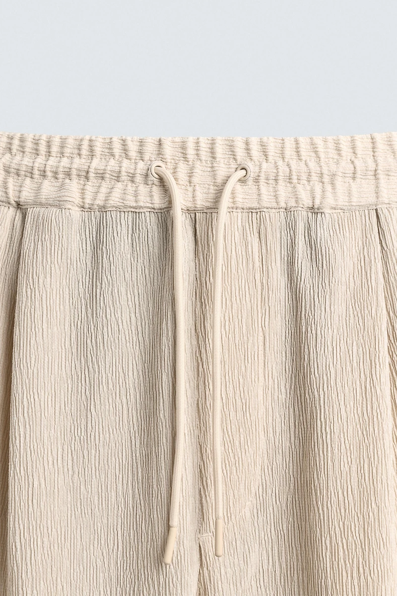 RELAXED FIT EMBOSSED SHORTS