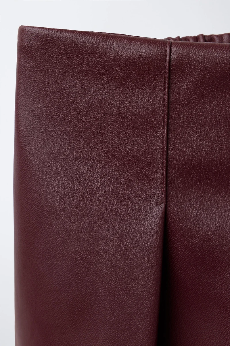 FAUX LEATHER PLEATED SKORT