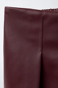 FAUX LEATHER PLEATED SKORT