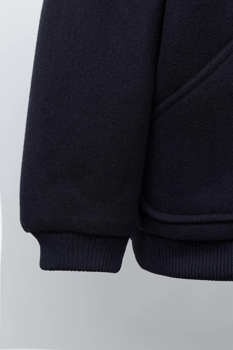 VESTE EN LAINE À POCHES