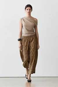Trousers with embroidered detail and elastic waistband