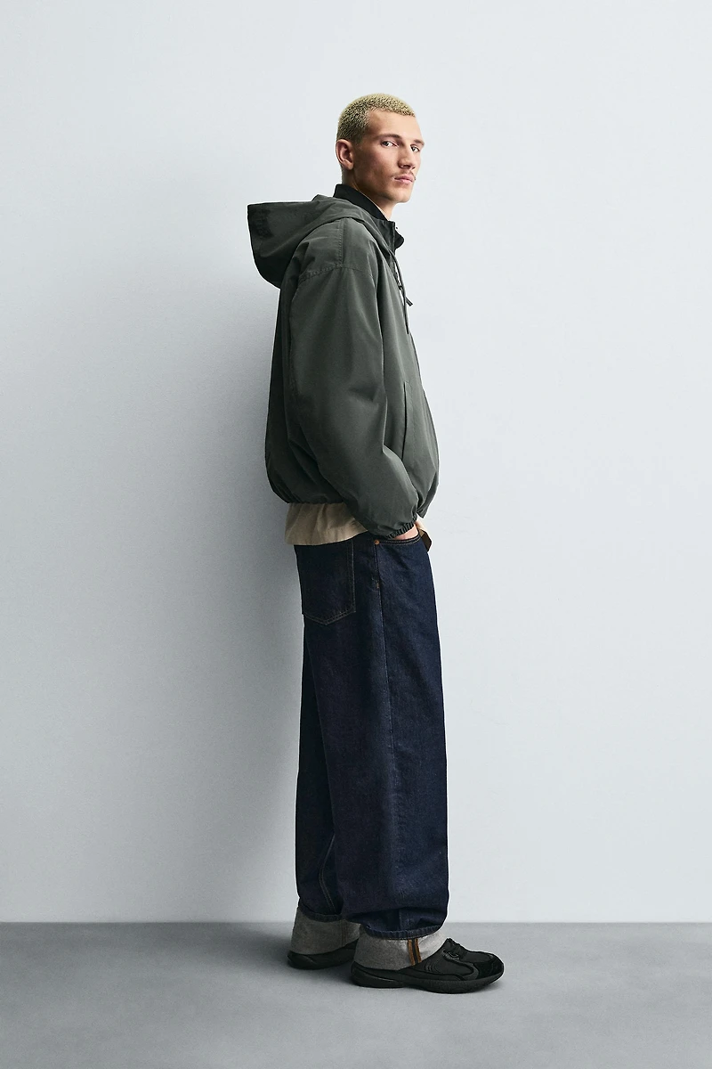 VESTE TECHNIQUE À CAPUCHE