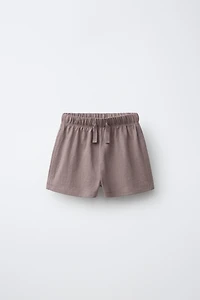 SHORT OVERSIZE SURPIQÛRES