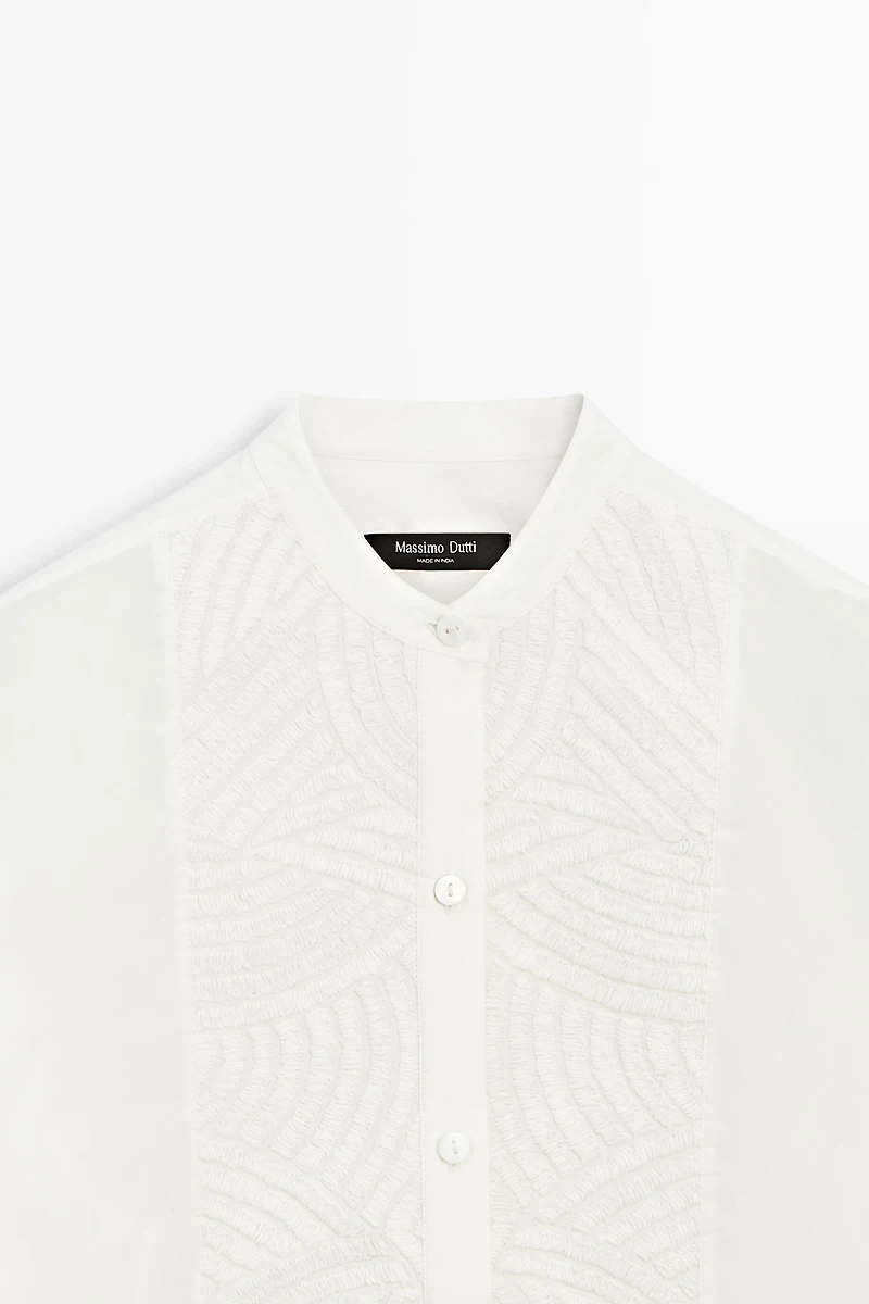 100% cotton poplin shirt with embroidered bib