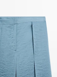 Flowing palazzo trousers with slits