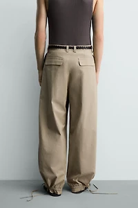 PANTALON COUPE BALLON À PLIS